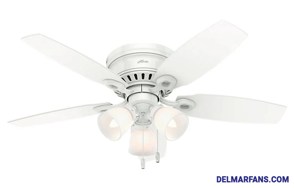 A large, sleek ceiling fan with three blades in a contemporary living room scene.