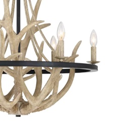 A chandelier decorated in antlers