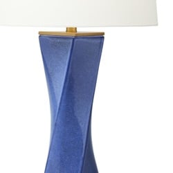 A close-up of a blue table lamp