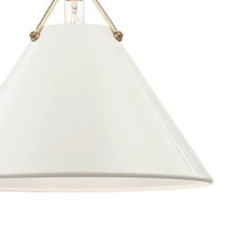 A close-up of an off-white pendant light
