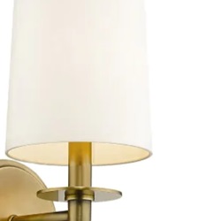 A close-up of parchment shade wall light